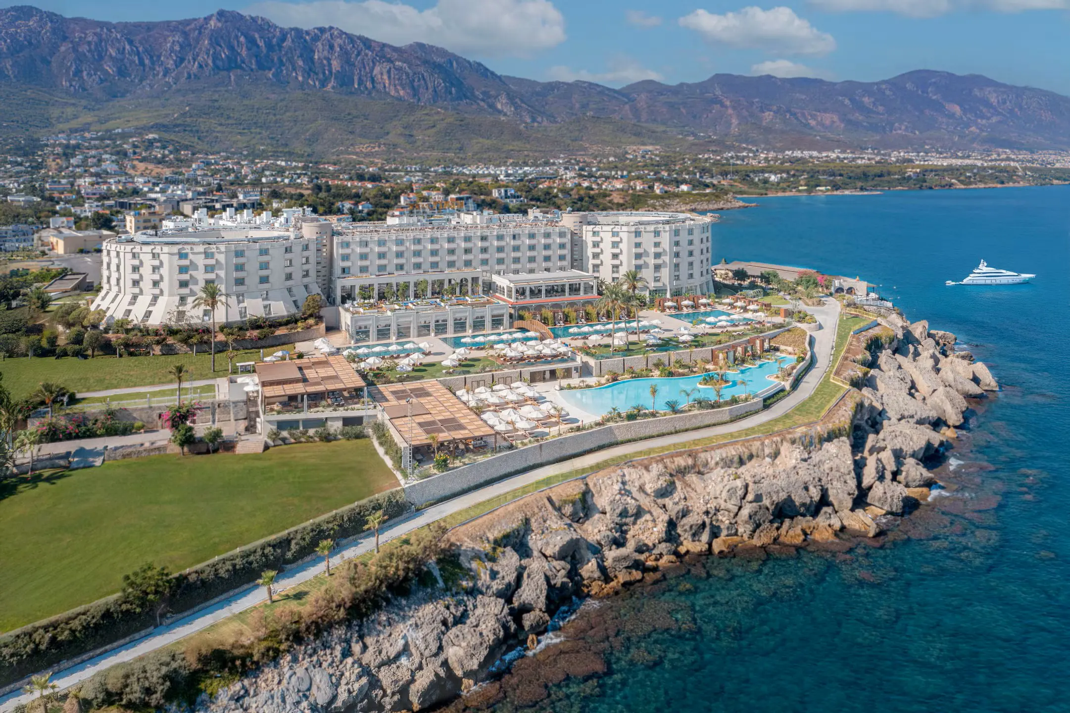 Luxury private taxi arriving at Merit Park Hotel & Casino, a castle-inspired 5-star resort in Karaoğlanoğlu, Kyrenia, North Cyprus