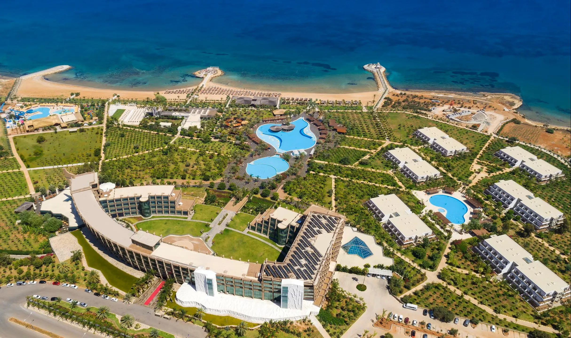 Private taxi transfer arriving at Noah's Ark Deluxe Hotel from Larnaca Airport